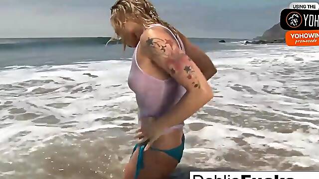 A ash-blonde gal with smallish breasts loves smoking while posing in a studio and on the beach