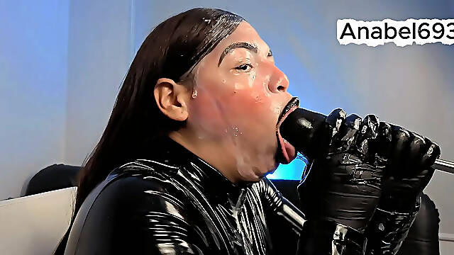 A Demon Dressed in Latex, Latex Gloves, a Latex Suit, and Black Lips, Sensually Sucks Your Cock and Spits Saliva and Semen on Me