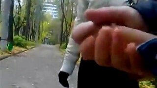 We have seen many videos of this man walking through the park and masturbating in front of women. This time she got a short handjob before ejaculating.