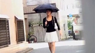 Curvy alluring Asian whore is thinking about her duties, so no wonder her attention isn.t so good, especially when some crafty lad comes over and pulls down her top to see her beautiful perky boobs, before running on the other side of the street.