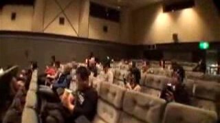 Mischievous in a movie theater