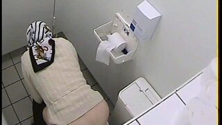 The old woman has come to the public toilet to release from her natural need and became the real star of the toilet voyeur video when cam shot her granny ass while pissing