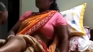 Horny young Indian boy sucking his maid hot pussy while his parents is away for work and she is happy to fulfill his wish.