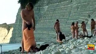 Outdoor blowjob on nude public beach
