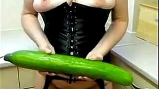 Another mature woman with a huge cunt inserting a cucumber. Not a regular one but a king sized.