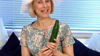 Watch a seasoned housewife indulge in her secret fetish with a seductive twist. This sensual encounter with a cucumber will leave you craving more!