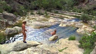 Together with my friend Yvi I was in the nudist canyon in France. First we wore our mini bikinis, but soon we were completely naked