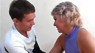 Russian Mother With A Young Guy