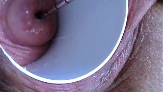 Open pussy with a glass and using sounds for fucking the cervix while vibrator in clitoris. Cervix fucking with more than 8 cms (3.15 Inch) deep. Extreme gyno cervical masturbation.