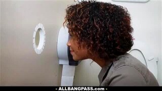 Sweet mixed chick on her knees in the toilet sucking black cock