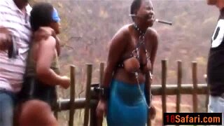 Two natural tittied African sluts chained to a fence and dominated hard by a two German horny stud. They smack their tits hard and torture their nipples outdoor.