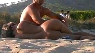 Experience the thrill of outdoor pleasure on a hot nude beach with a sexy girl. Let her work her magic with a handjob and blowjob.